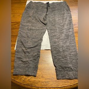 Woman in gray capris. Size 16/18